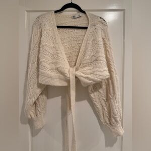 Zara knitted wrap sweater. Size small. Knitted cream color wrap around sweater